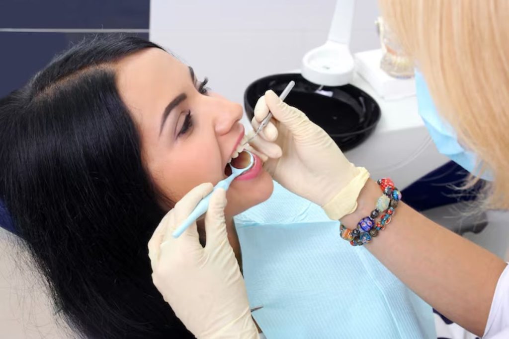 patient undergoing expose and bond procedure to guide an impacted tooth into alignment